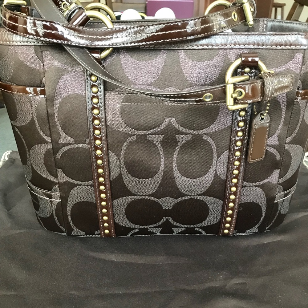 Dark chocolate brown Coach Purse with stud details